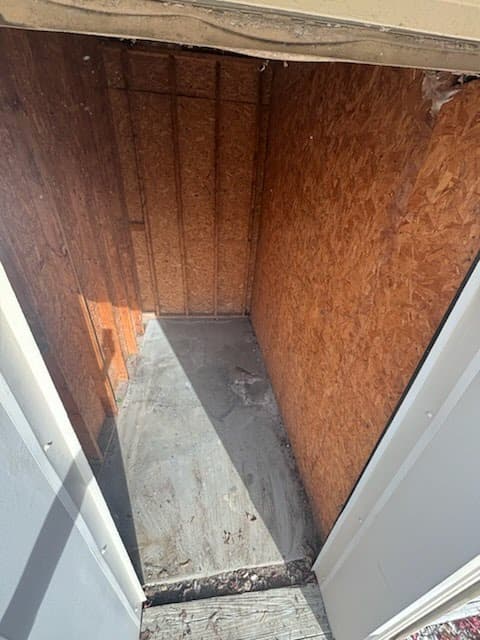 Storage unit after — completely empty and clean