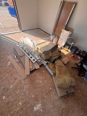 Office cleanout — carpet, drywall, and construction debris
